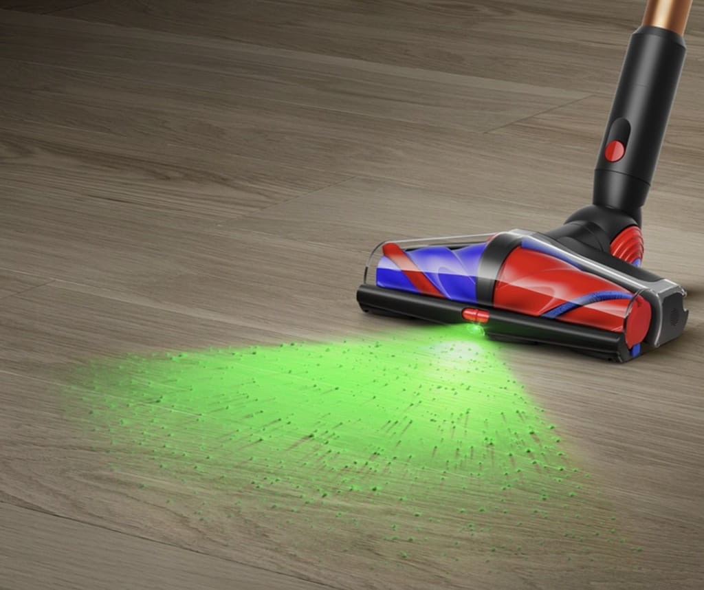 Zielony laser wykrywający kurz na podłodze drewnianej Dyson V16